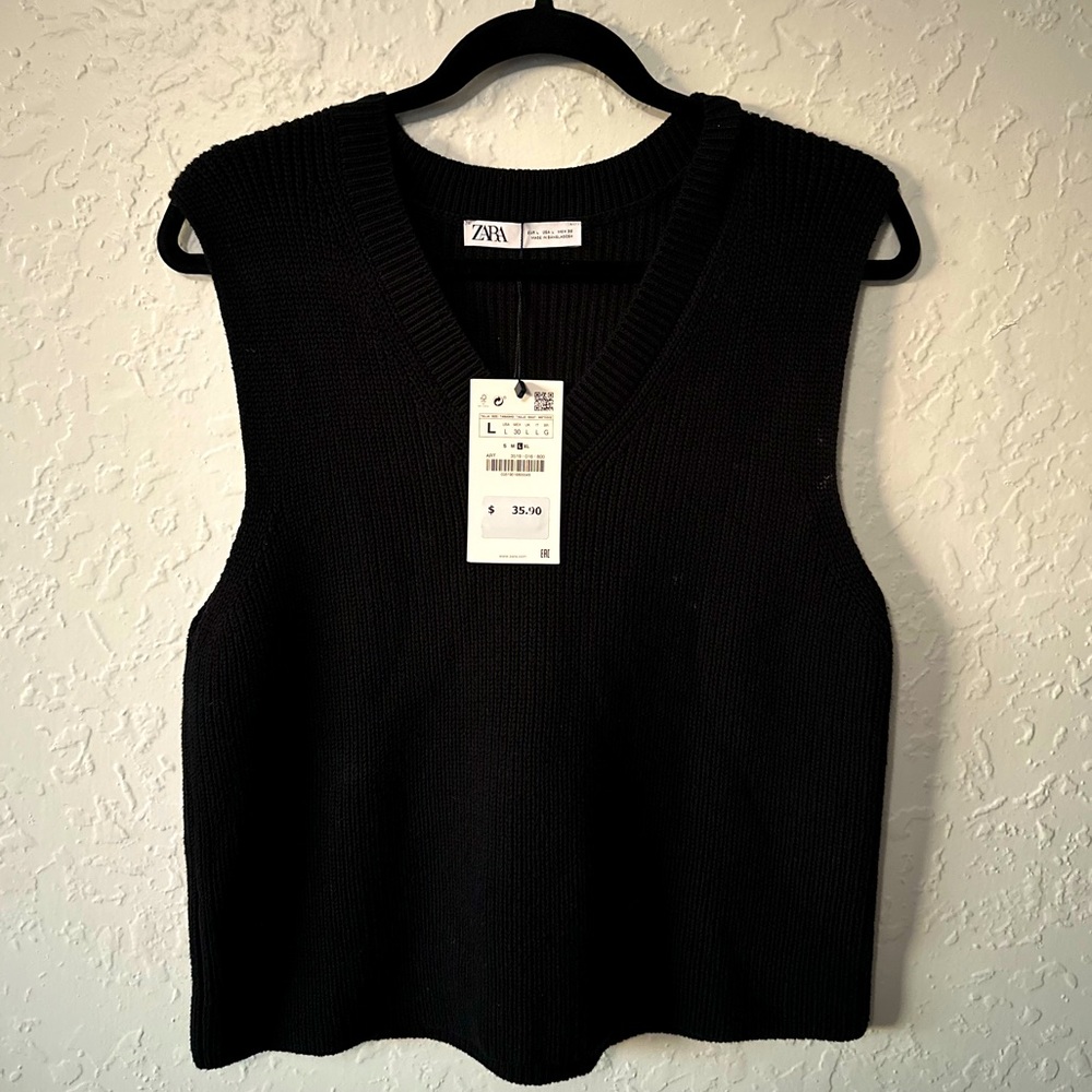Women’s v-neck knit vest.